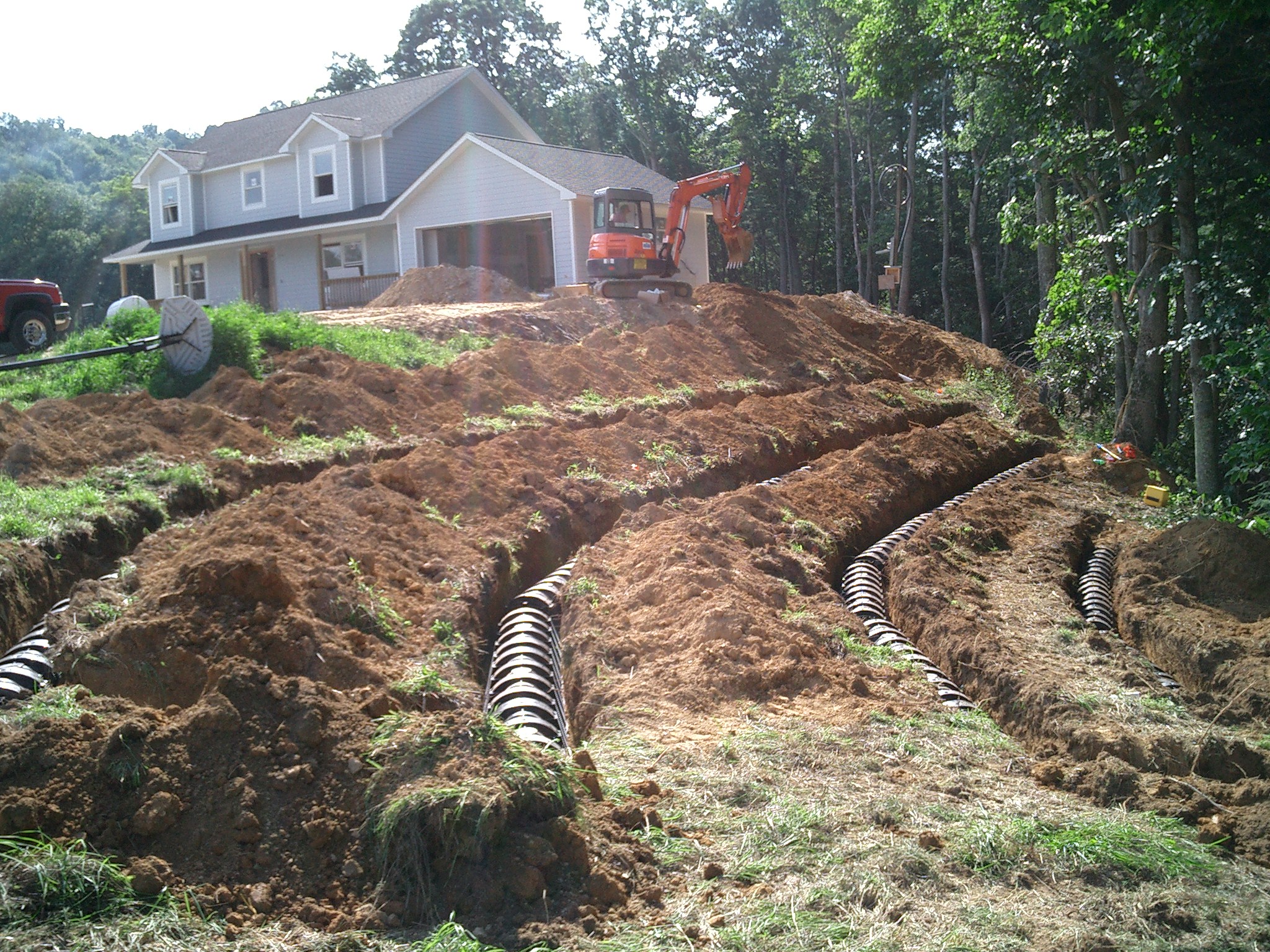 Exposed Drain Field Of Septic System For Private Home On Steep Slope