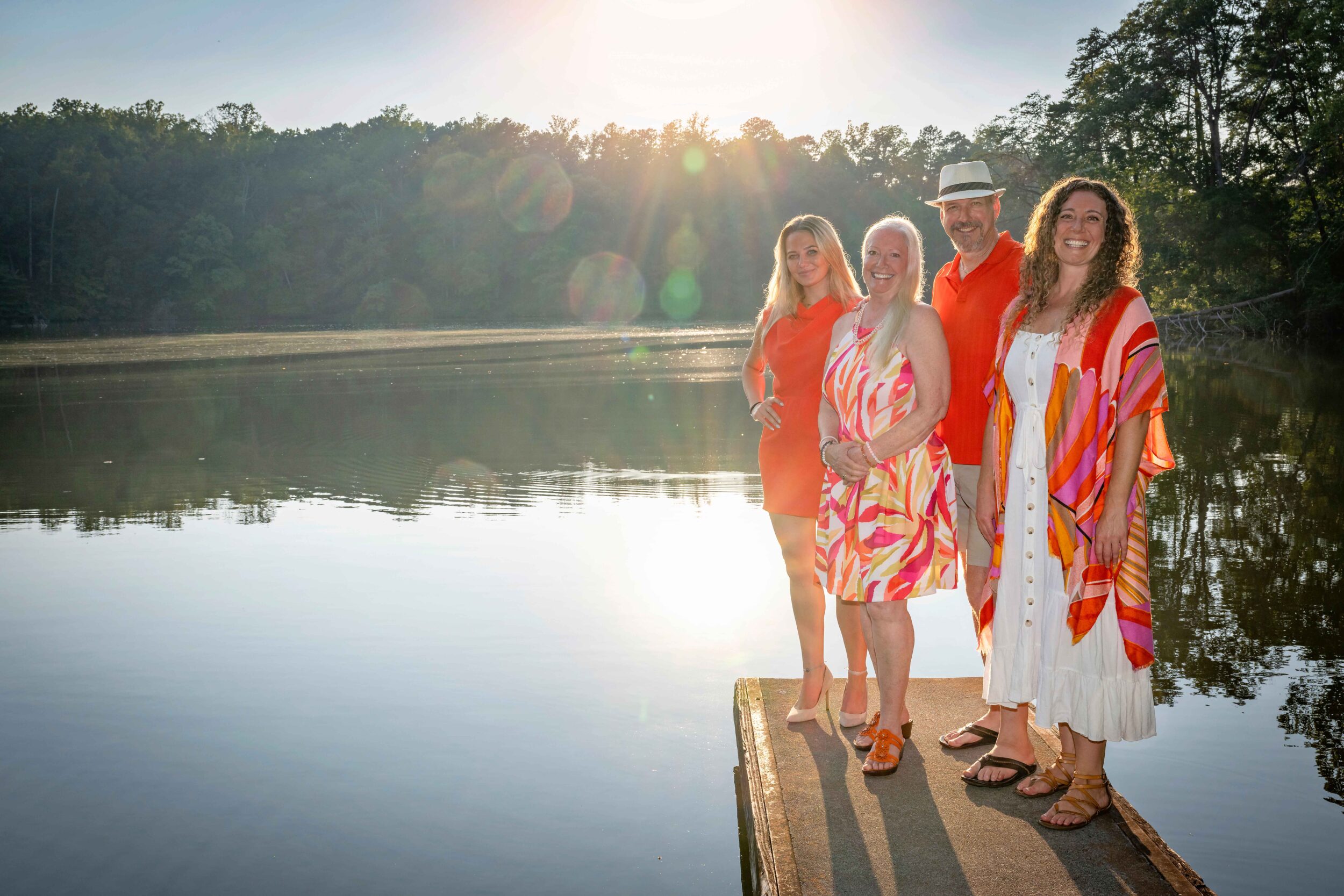 Team On Dock Of Lake