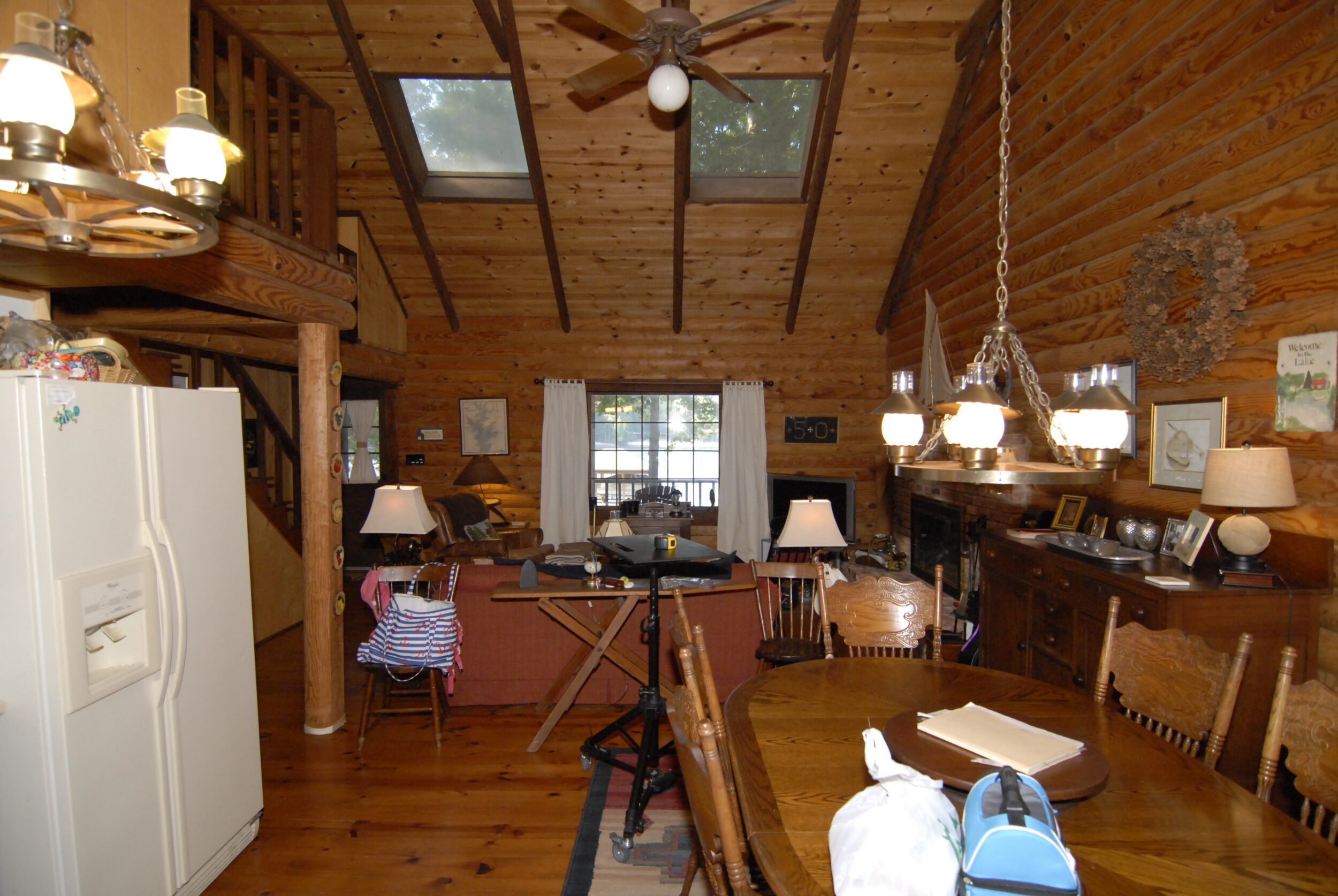 Before After Renovation Forest Log Cabin Great Room Kitchen Dining Area Skylight