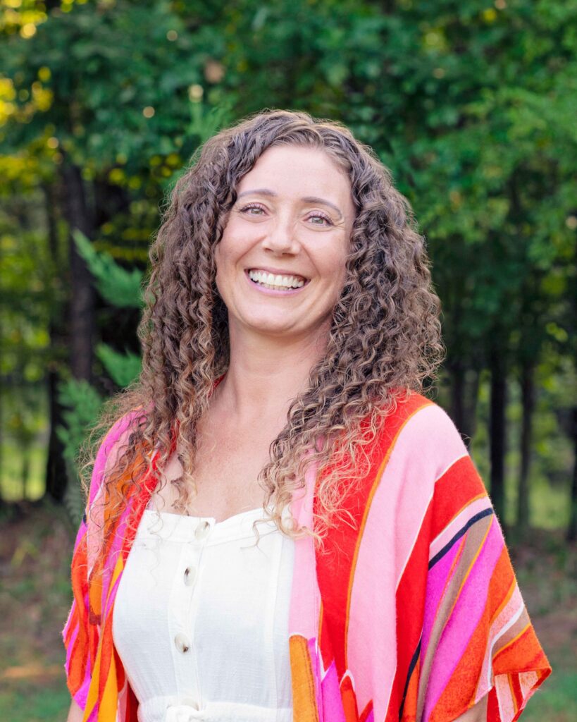 Curly Haired Woman In Nature