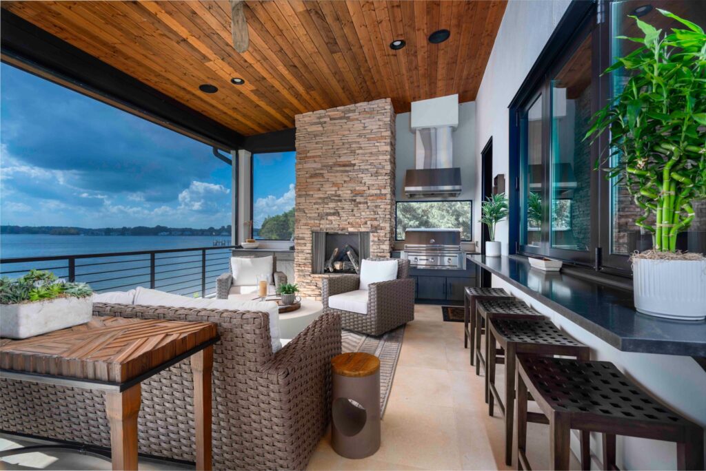 Outdoor Lounge With Pass Through Window To Bar Fireplace Grill And Epic Views Of The Lake