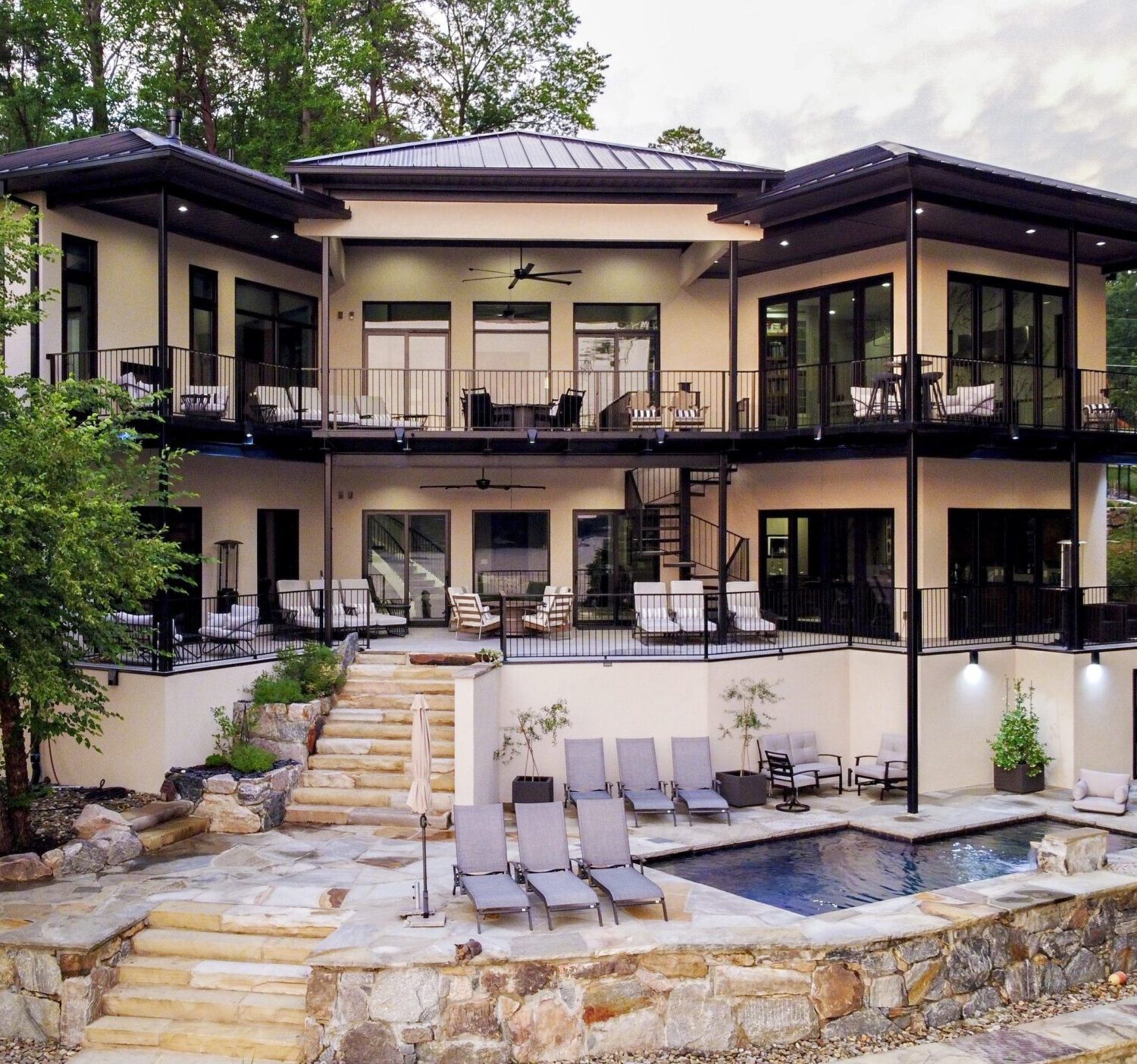 two level outdoor overlooking terraced pool and patio